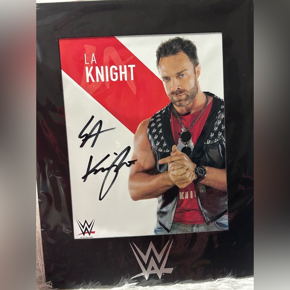 WWE Autographed LA Knight Poster